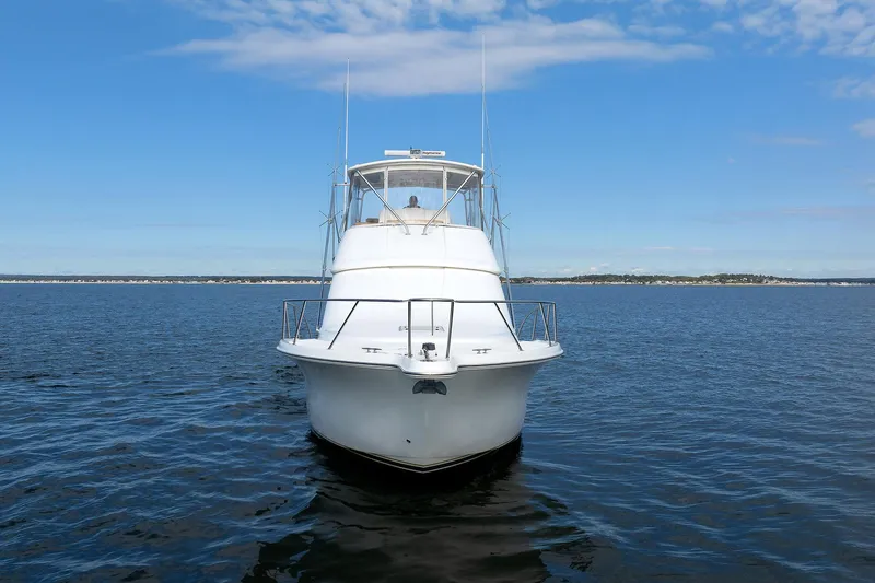 Chasing Tail Yacht Photos Pics 2007 Tiara Yachts 3900 Convertible on open water, front view.