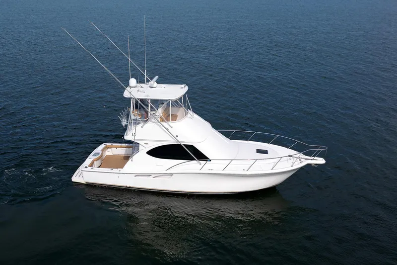 Chasing Tail Yacht Photos Pics 2007 Tiara Yachts 3900 Convertible cruising on open water.