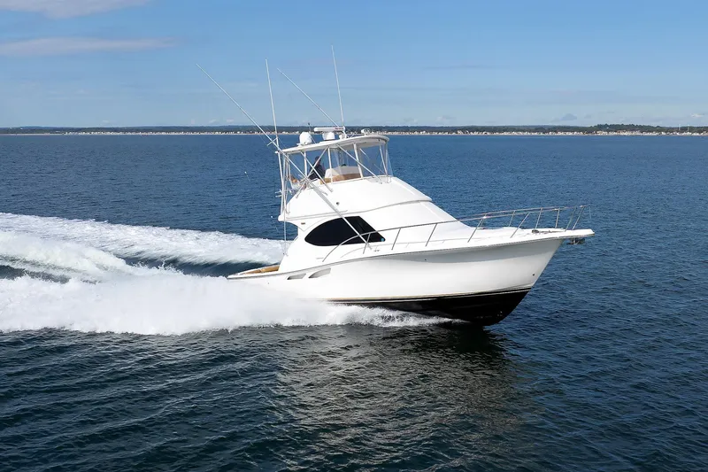 Chasing Tail Yacht Photos Pics 2007 Tiara Yachts 3900 Convertible cruising on open water.