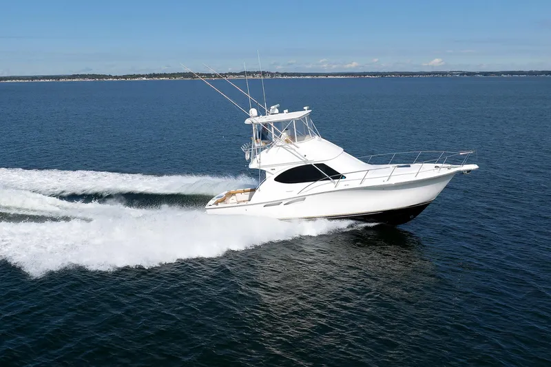 Chasing Tail Yacht Photos Pics 2007 Tiara Yachts 3900 Convertible cruising on open water.