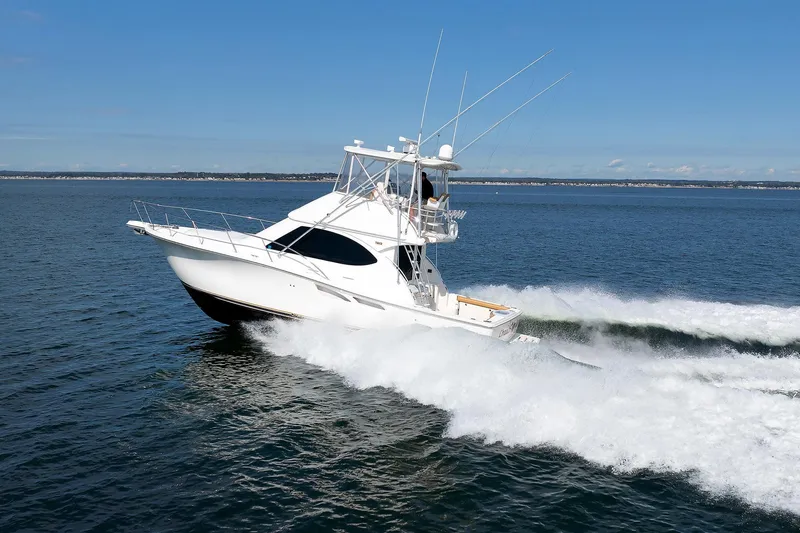 Chasing Tail Yacht Photos Pics 2007 Tiara Yachts 3900 Convertible cruising on open water.