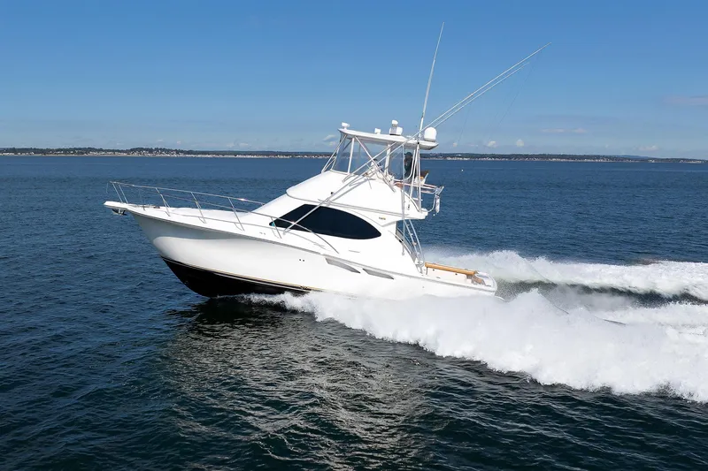 Chasing Tail Yacht Photos Pics 2007 Tiara Yachts 3900 Convertible cruising on open water.