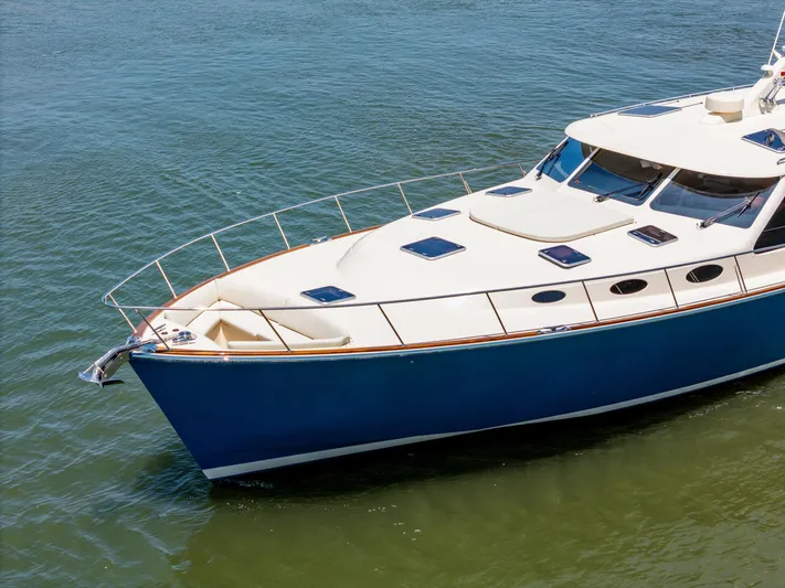 Margin Yacht Photos Pics 2025 Palm Beach Motor Yachts PB70 cruising on calm waters.