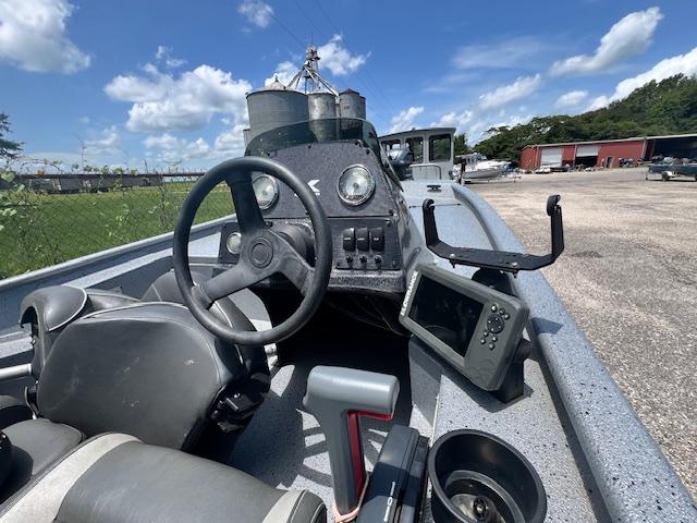 2017 Express XP7 boat dashboard with steering wheel and navigation equipment.