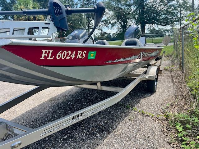 2017 Express XP7 boat on trailer with registration FL 6024 RS.
