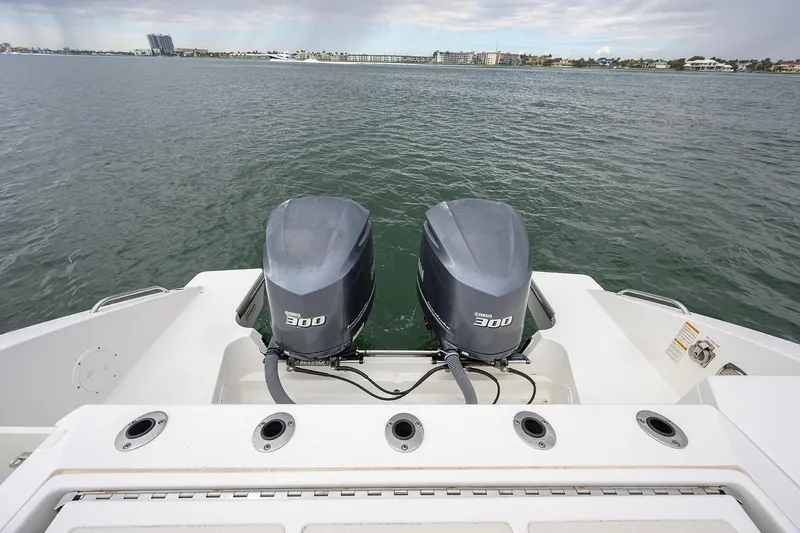  Yacht Photos Pics 2019 Pursuit S 328 Sport boat with dual Yamaha 300 engines on open water.