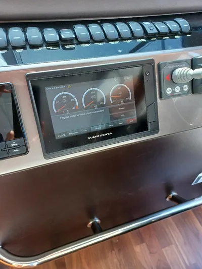 Must Sell, Make An Offer Yacht Photos Pics Control panel of a 2022 Galeon 410 HTC yacht with digital display and controls.