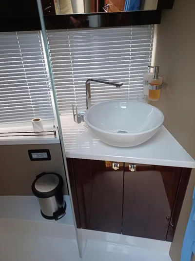 Must Sell, Make An Offer Yacht Photos Pics Modern bathroom sink in 2022 Galeon 410 HTC yacht with sleek design and fixtures.