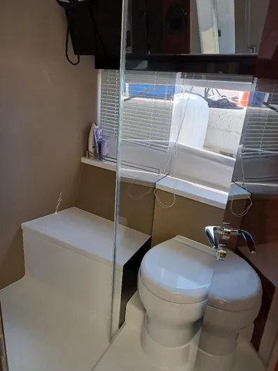 Must Sell, Make An Offer Yacht Photos Pics Bathroom interior of 2022 Galeon 410 HTC yacht with modern fixtures and compact design.