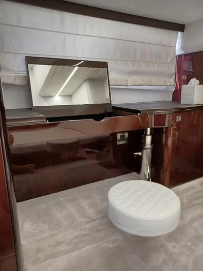 Must Sell, Make An Offer Yacht Photos Pics Interior of 2022 Galeon 410 HTC yacht with elegant vanity and cushioned stool.