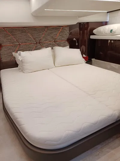 Must Sell, Make An Offer Yacht Photos Pics Luxurious bedroom interior of 2022 Galeon 410 HTC yacht with elegant bedding.