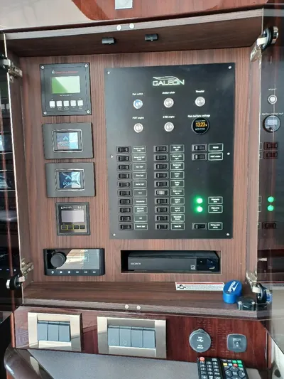 Must Sell, Make An Offer Yacht Photos Pics Control panel of 2022 Galeon 410 HTC yacht with various switches and displays.