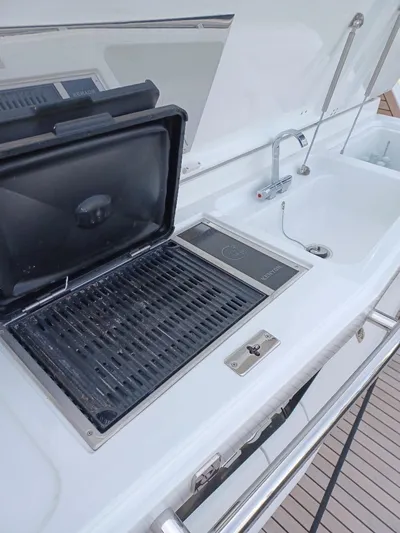 Must Sell, Make An Offer Yacht Photos Pics Outdoor kitchen on 2022 Galeon 410 HTC yacht with grill and sink.