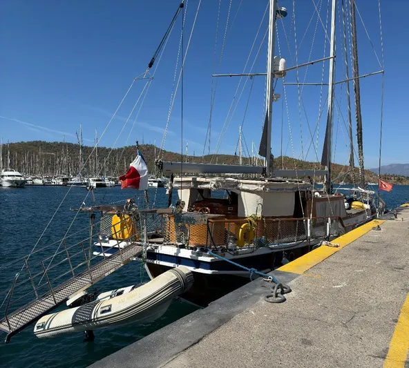 Hama Yacht Photos Pics Custom 1994 ABATS Gulet Ketch docked at marina with inflatable boat attached.