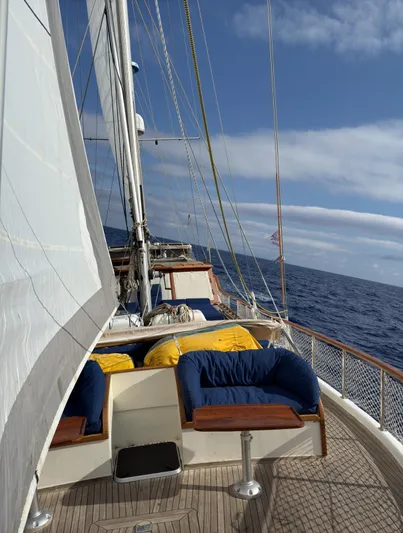 Hama Yacht Photos Pics Sailing on a 1994 Custom ABATS Gulet Ketch with blue cushions and open sea view.