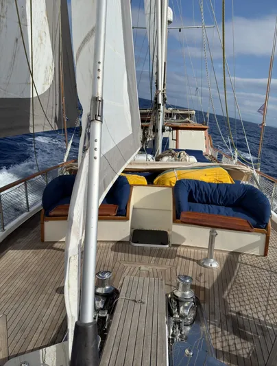 Hama Yacht Photos Pics Sailing on a 1994 Custom ABATS Gulet Ketch with blue cushions and open sea view.