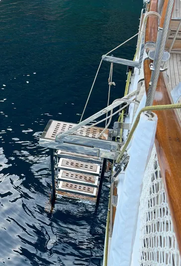 Hama Yacht Photos Pics Staircase on Custom ABATS GULET KETCH yacht, 1994, leading to calm water.