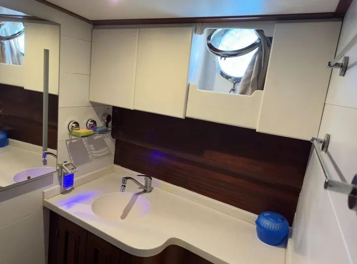 Hama Yacht Photos Pics Bathroom interior of 1994 Custom ABATS GULET KETCH yacht with sink and porthole window.