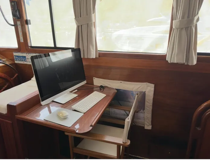 Hama Yacht Photos Pics Wooden yacht interior with computer desk setup on ABATS GULET KETCH, 1994 model.