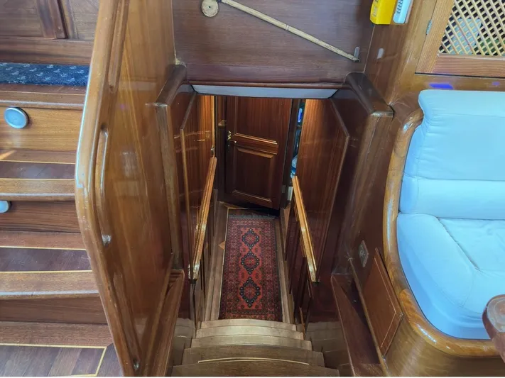 Hama Yacht Photos Pics Wooden interior staircase on 1994 Custom ABATS Gulet Ketch yacht, featuring elegant design.