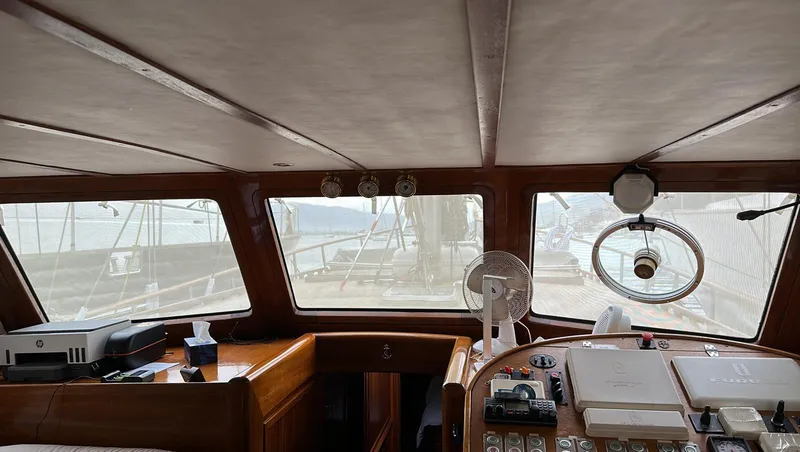 Hama Yacht Photos Pics Interior view of 1994 Custom ABATS Gulet Ketch yacht cockpit with navigation equipment.