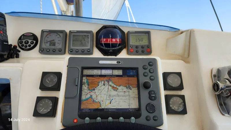 Yacht Photos Pics Navigation instruments on a 2007 Leopard 40 catamaran, featuring a GPS display and compass.