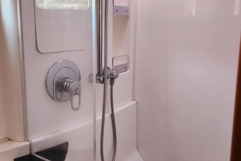  Yacht Photos Pics Shower area in a 2007 Leopard 40 yacht, featuring modern fixtures and sleek design.