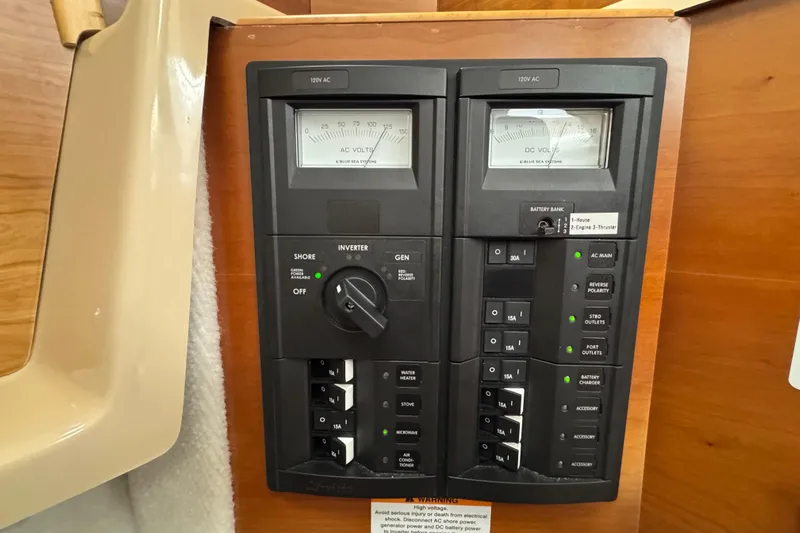  Yacht Photos Pics Electrical control panel on a 2014 Cutwater 28 boat, featuring AC and DC volt meters.