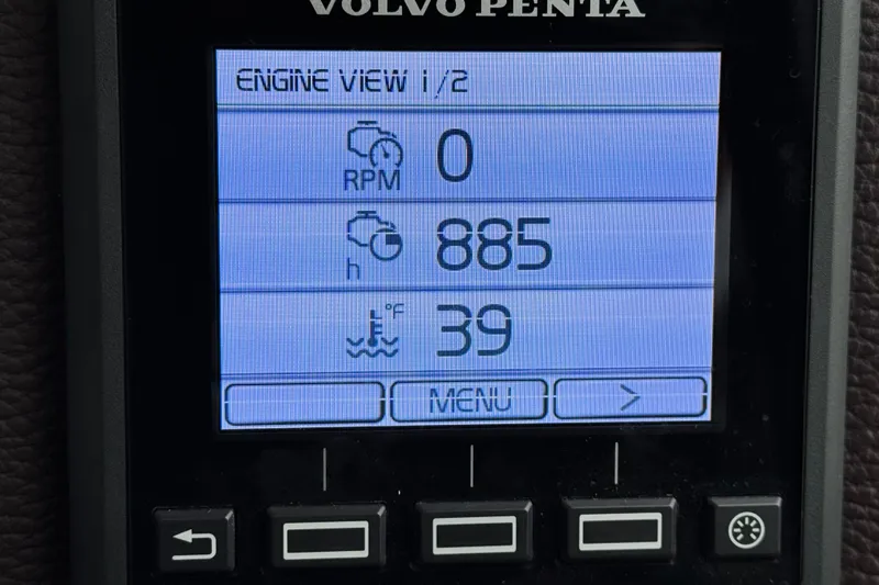  Yacht Photos Pics Volvo Penta engine display on 2014 Cutwater 28, showing RPM, hours, and temperature.