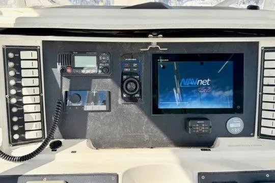  Yacht Photos Pics Control panel of a 1997 Marlin Yachts 350SF with navigation and communication equipment.