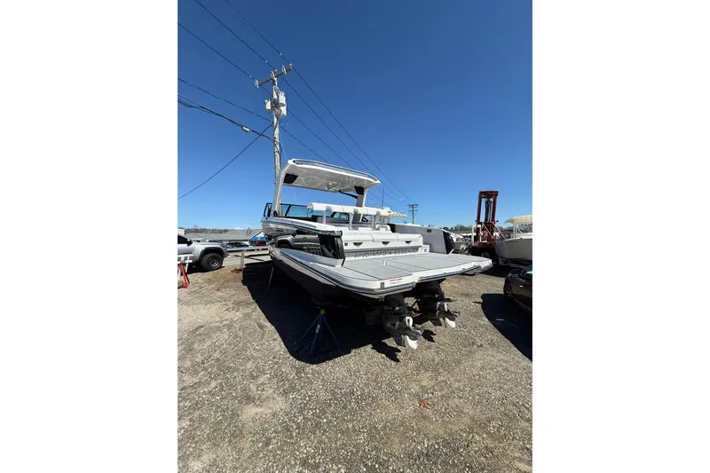 Andiamo Yacht Photos Pics 2023 Aviara AV32 I/O boat on display in a sunny outdoor setting.