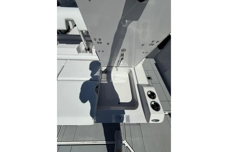 Andiamo Yacht Photos Pics 2023 Aviara AV32 I/O boat interior with sleek white design and modern fixtures.