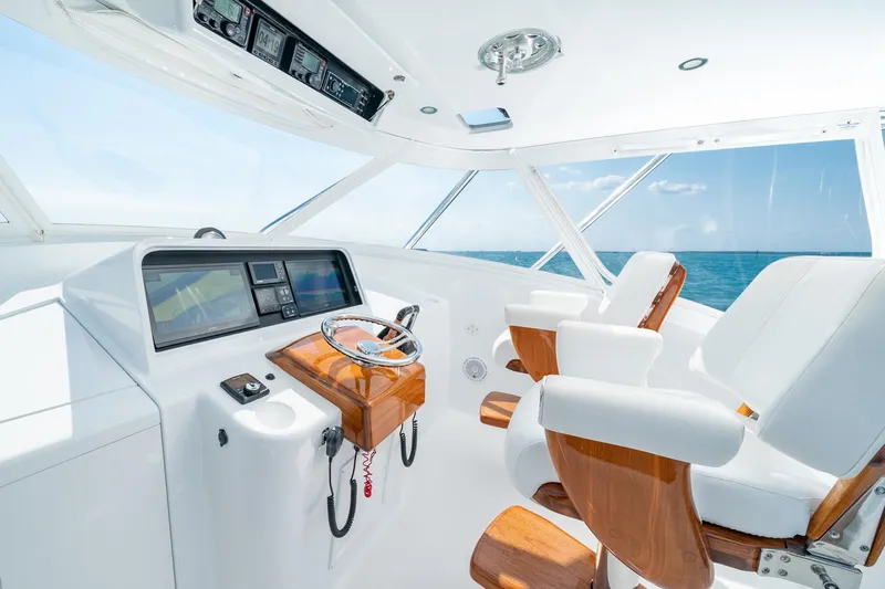 Hawk's Nest Yacht Photos Pics 2012 Shearline 34' Express yacht helm with modern controls and ocean view.