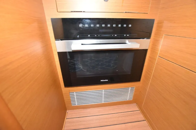  Yacht Photos Pics Modern kitchen appliance in 2023 Beneteau Swift Trawler 41 Fly yacht interior.