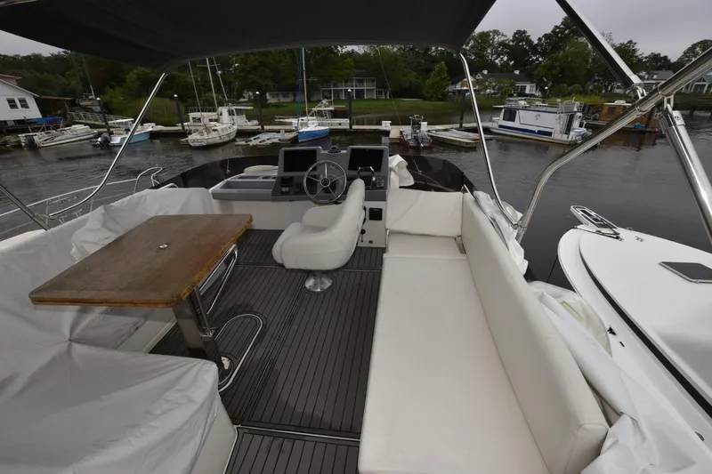  Yacht Photos Pics Flybridge of 2023 Beneteau Swift Trawler 41 Fly with seating and helm station.