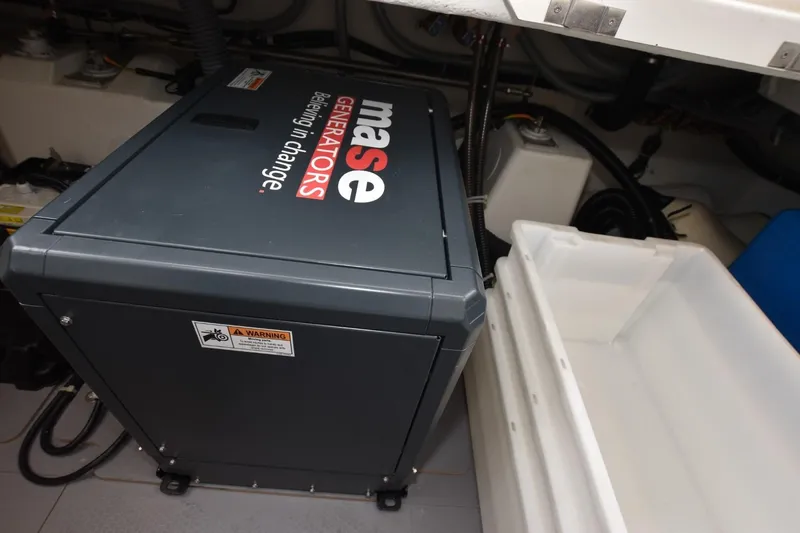  Yacht Photos Pics Engine room of 2023 Beneteau Swift Trawler 41 Fly with Mase generator.
