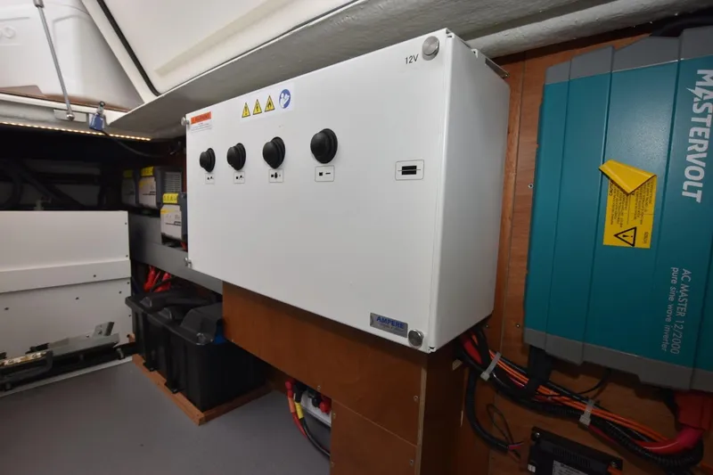  Yacht Photos Pics Electrical system in 2023 Beneteau Swift Trawler 41 Fly, featuring control panel and Mastervolt inverter.