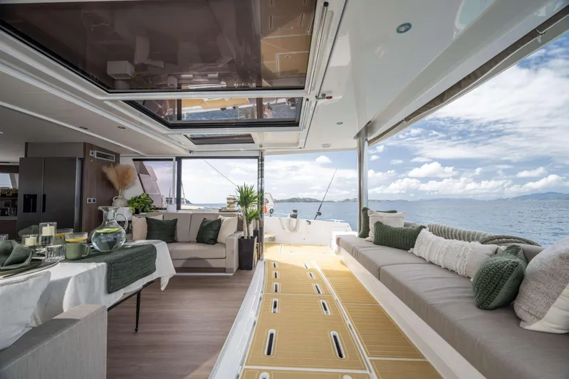 High 5 Yacht Photos Pics Luxurious interior of 2024 Bali 5.4 yacht with ocean view and elegant decor.