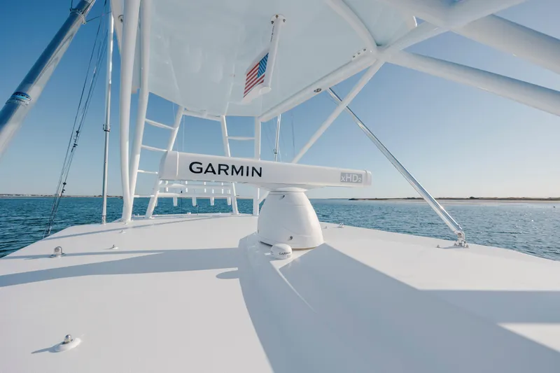  Yacht Photos Pics 2024 Invincible 46 Pilothouse with Garmin radar on open sea.