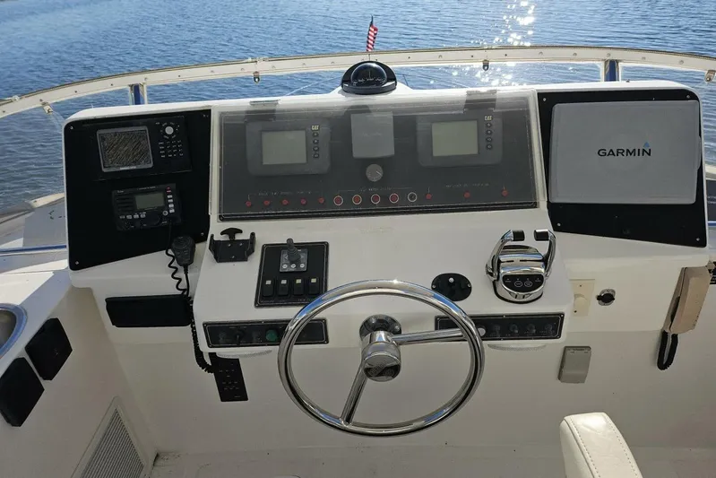  Yacht Photos Pics Control panel of a 2003 Johnson FLY boat with Garmin navigation system.