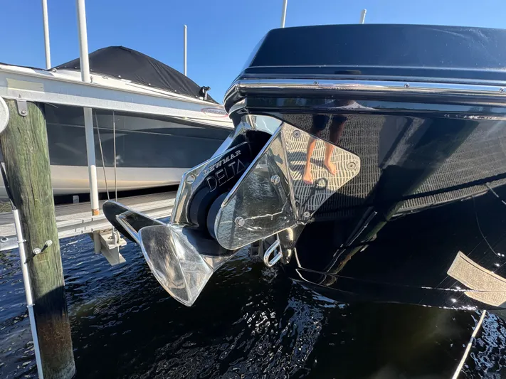  Yacht Photos Pics Anchor of a 2025 Aviara 28 Surf boat in water.