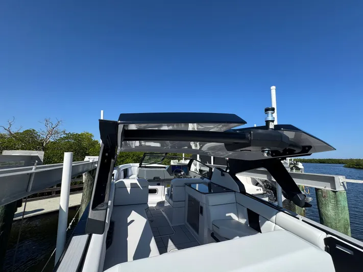  Yacht Photos Pics Aviara 28 Surf 2025 boat docked under clear blue sky.