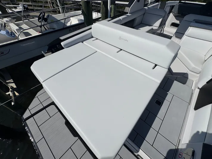  Yacht Photos Pics Aviara 28 Surf 2025 with luxurious white lounging area.