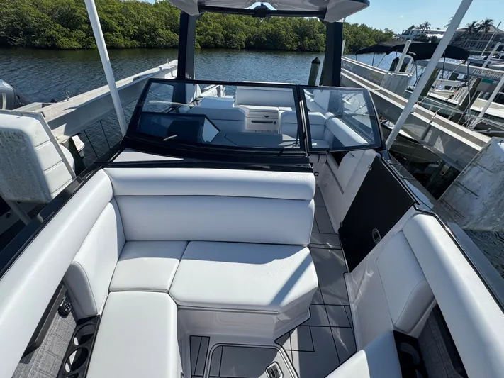  Yacht Photos Pics Interior of 2025 Aviara 28 Surf with luxurious white seating.