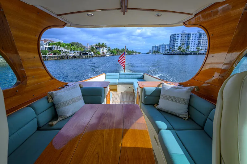 Mint Chip Yacht Photos Pics 2017 Hinckley Picnic Boat 37 MKIII interior with elegant seating and waterfront view.