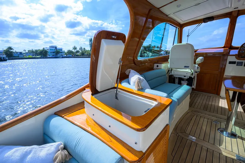 Mint Chip Yacht Photos Pics Luxurious 2017 Hinckley Picnic Boat 37 MKIII interior with elegant seating and scenic water view.