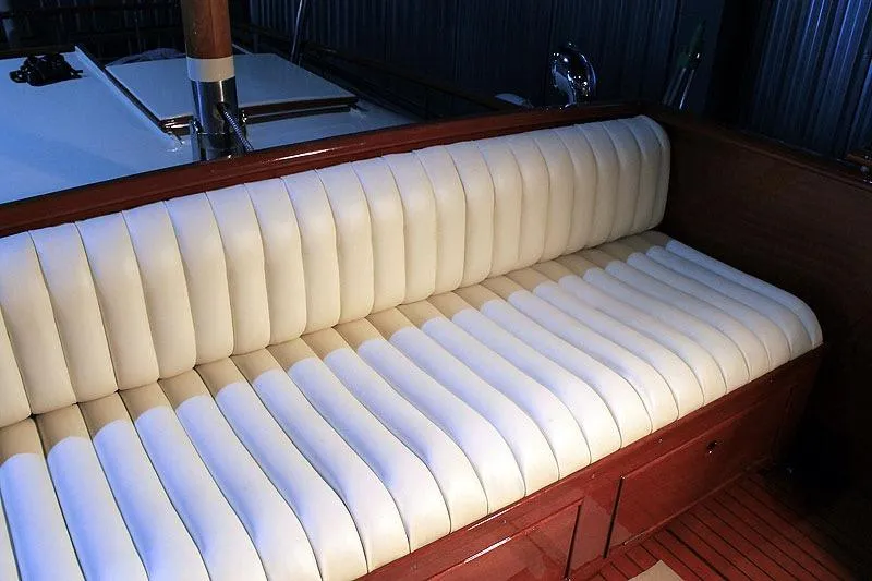 Allez Yacht Photos Pics 1930 Chris-Craft Commuter boat with elegant white leather seating and wooden accents.