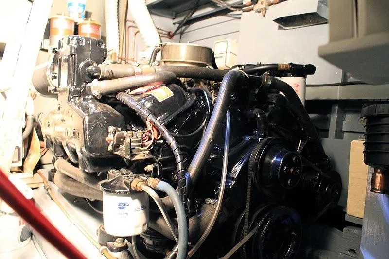 Allez Yacht Photos Pics Engine of a 1930 Chris-Craft Commuter boat, showcasing intricate mechanical components.