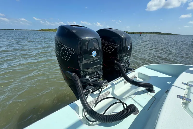 Yacht Photos Pics Twin Mercury Racing outboard engines on a 2018 Conch 30 boat, cruising on open water.