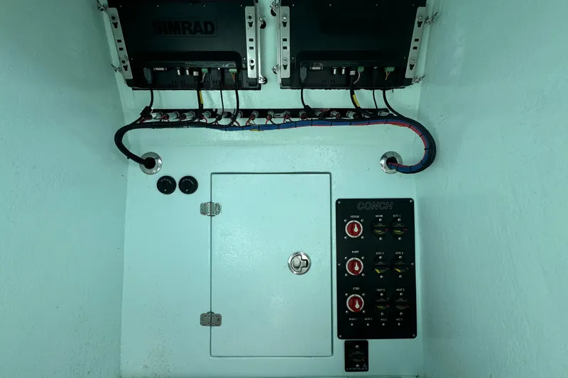  Yacht Photos Pics Electrical panel of a 2018 Conch 30 boat with Simrad equipment.